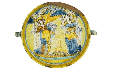 Bowl Bowl with two elaborate handles. Majolica painted in polychromy...