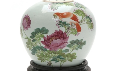 A Chinese porcelain bojar, decorated in colours with peony and bird. Early Republic. Wooden stand incl.
