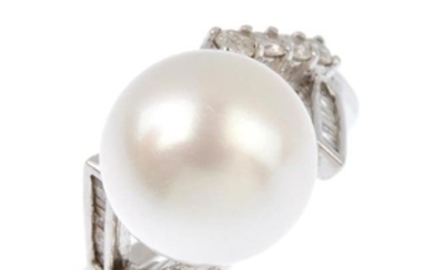A diamond and cultured pearl ring. The cultured pearl