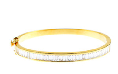 A diamond hinged bangle. View more details