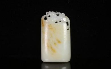 A HETIAN JADE WAIST PENDANT WITH SCULPUTED DRAGON