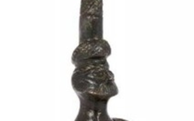 A Hittite bronze figure of a bearded...