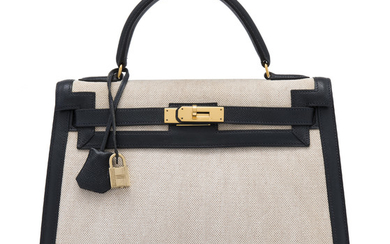 AN INDIGO COURCHEVEL LEATHER & TOILE SELLIER KELLY 32 WITH GOLD HARDWARE, HERMÈS, 1993