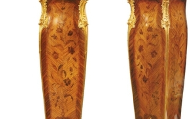 Joseph-Emmanuel Zwiener (1848 - 1895) A pair of French gilt-bronze mounted kingwood, tulipwood and floral marquetry gaines, Paris, circa 1885