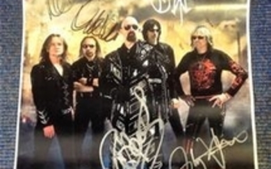 Judas Priest signed 16x12 poster photo. Good Condition. All signed pieces come with a Certificate of Authenticity. We combine......
