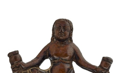 A RARE SMALL BRONZE FIGURE OF A MALE ATTENDANT, TIBET OR NEPAL, 15TH-16TH CENTURY