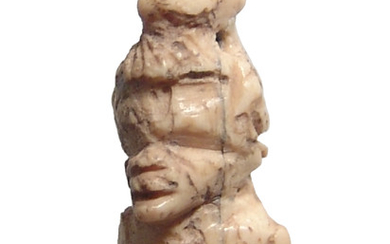 Romano-Egyptian bone amulet in form of a Nubian bust