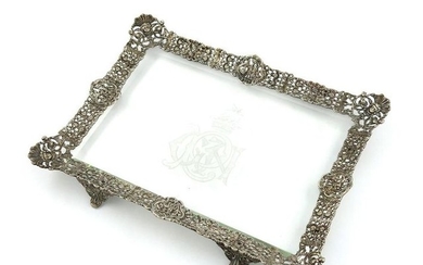 A Victorian silver-mounted glass dressing table tray, by...