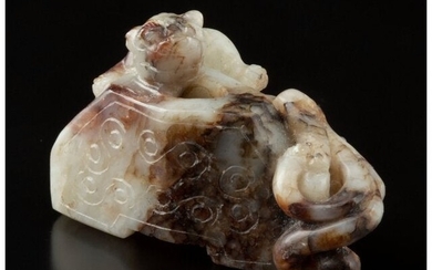 28027: A Chinese White and Russet Jade Nephrite Bead Ca