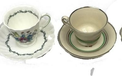 4 Porcelain Tea Cups and Saucers