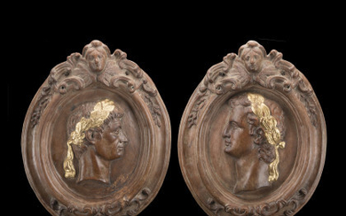Late 19th-century art. A pair of terracotta high-reliefs with profiles of Emperors (cm 56x47) (restorations)
