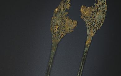A PAIR OF PARCEL-GILT SILVER HAIRPINS, TANG DYNASTY (AD 618-907)