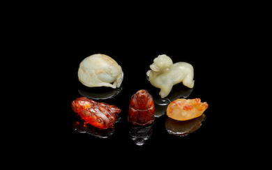 A group of green jade, agate and amber carvings