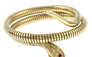 A 1950s 9ct gold coiled snake bangle, with ruby eye detail, by Cropp & Farr.