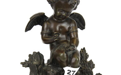 A 19th Century bronze figure of a cherub, H. 21cm.
