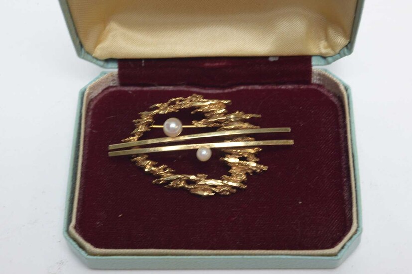 A 20th Century Modernist pearl and gold brooch
