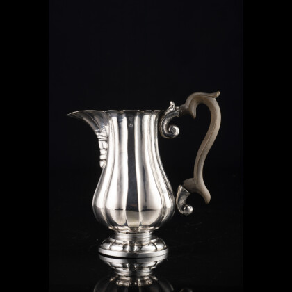 A 20th century silver ewer. Undeciphered marks (h. cm 14) (g gross 336)