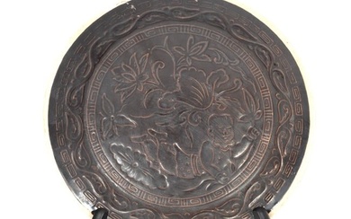 A Chinese Brown Glazed Ding 'Lotus and Child' Bowl