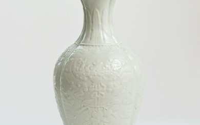 A Chinese Flower Carved White glazed Porcelain Vase