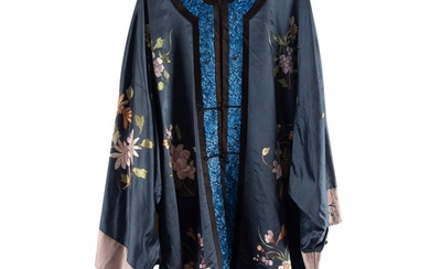 A Chinese blue silk robe, with hand-embroidered cerulean flo...