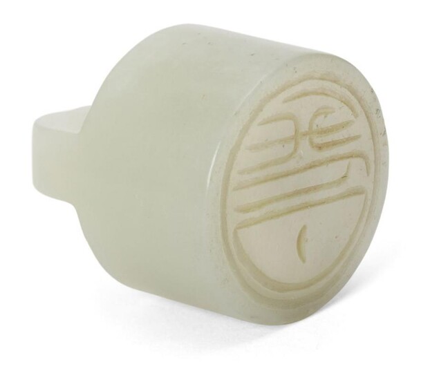 A Chinese pale green jade cylindrical seal,...