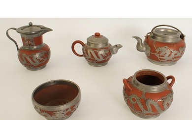 A Chinese pewter mounted Yixing red terracotta five-piece te...