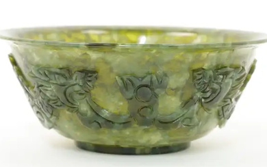 A Chinese spinach jade bowl, 20th century, with everted rim and short...