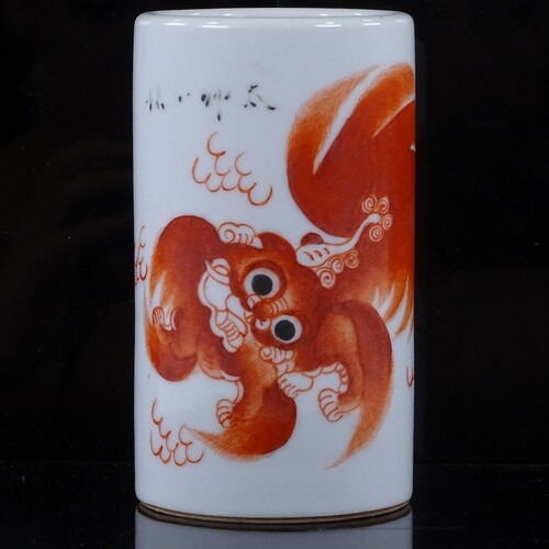 A Chinese white glaze porcelain brush pot, with painted drag...