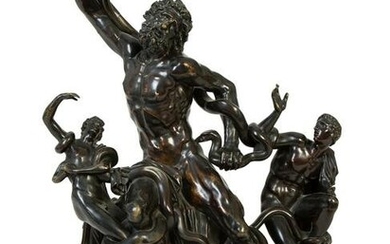 A Continental Patinated Bronze Figural Group After