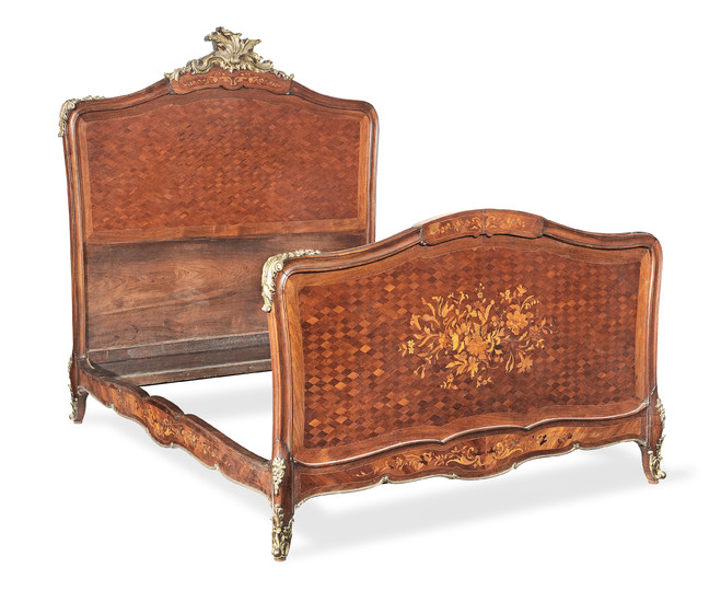 A French late 19th century gilt bronze mounted rosewood, kingwood, bois satine, amaranth marquetry and parquetry bed