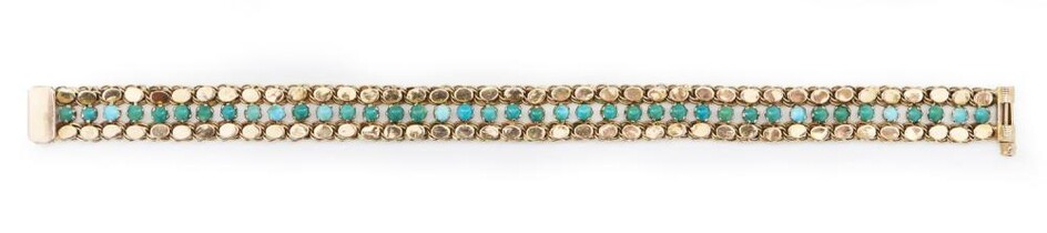 A GOLD AND TURQUOISE BRACELET
