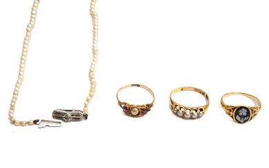 A GROUP OF THREE RINGS AND A PEARL NECKLACE