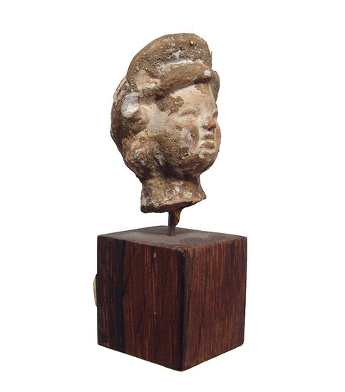 A Gandharan terracotta head of a woman