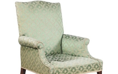 A George III mahogany and upholstered armchair
