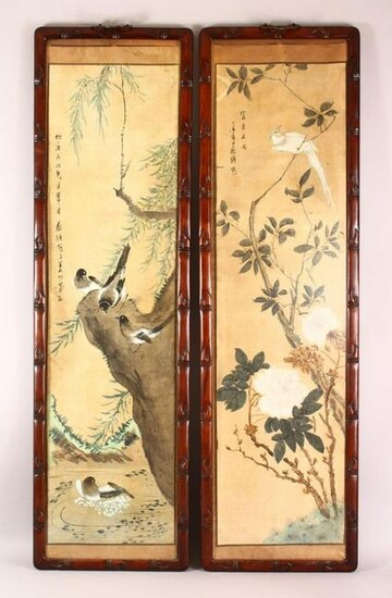 A LARGE PAIR OF HARDWOOD FRAMED CHINESE SCROLL