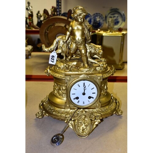 A LATE 19TH CENTURY GILT METAL FIGURAL MANTEL CLOCK, OF OVAL...