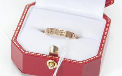 A LOVE RING BY CARTIER IN 18CT ROSE GOLD, SIZE L-M, 3GMS