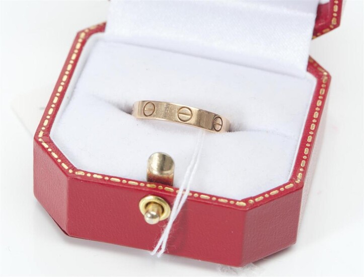 A LOVE RING BY CARTIER IN 18CT ROSE GOLD, SIZE L-M, 3GMS