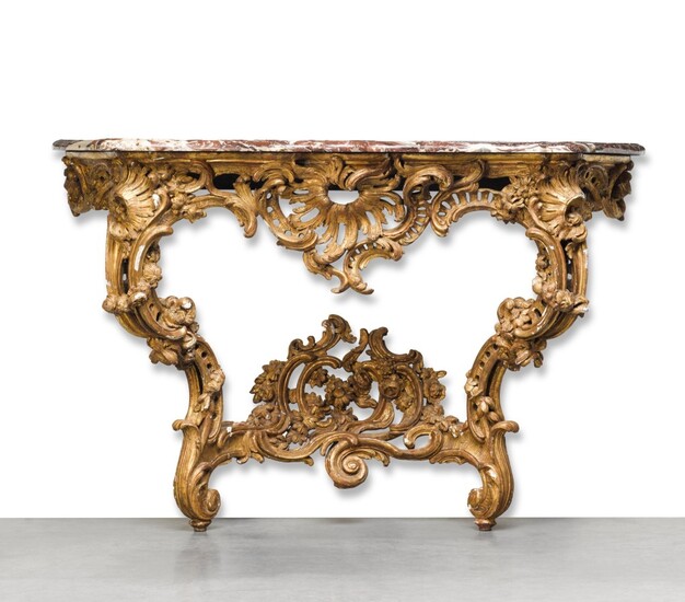 A Louis XV carved giltwood console table, circa 1730/40