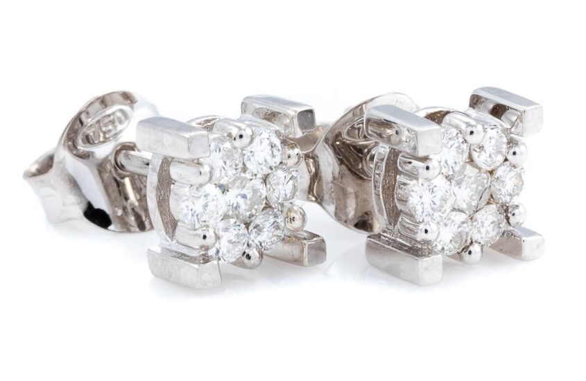 A PAIR OF DIAMOND CLUSTER STUD EARRINGS; each set in 18ct white gold with 7 round brilliant cut diamonds, 14 diamonds total approx....