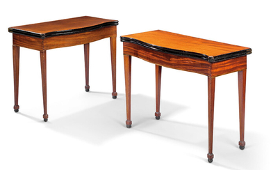 A PAIR OF GEORGE III EBONISED AND FRUITWOOD INLAID MAHOGANY SERPENTINE GAMES TABLES, CIRCA 1775