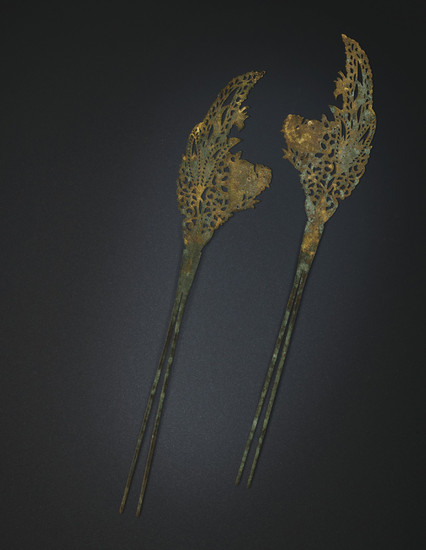 A PAIR OF PARCEL-GILT SILVER HAIRPINS, TANG DYNASTY (AD 618-907)