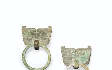 A PAIR OF UNUSUAL BRONZE TAOTIE MASKS AND RING HANDLES, HAN DYNASTY (206 BC-AD 220)