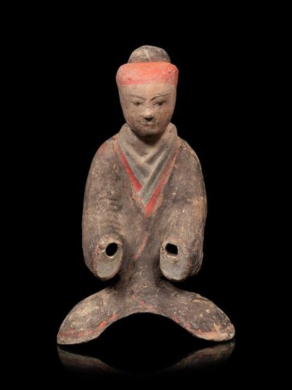 A Painted Pottery Figure of a Seated Lady