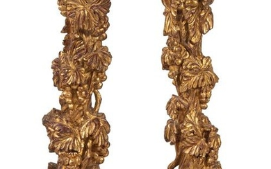 A Pair of Continental Giltwood Candlesticks