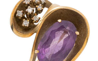 A RETRO 14CT GOLD AMETHYST AND DIAMOND RING; bypass loop...