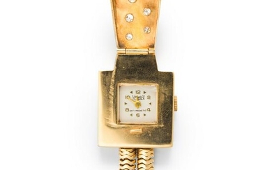 A Retro diamond and fourteen karat yellow gold bracelet