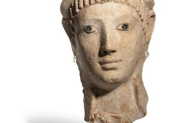 A Romano-Egyptian Stucco Mummy Mask with Glass Eyes