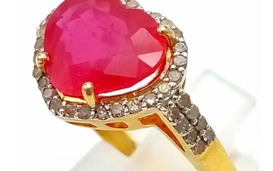 A Ruby Heart-Shaped Ring with Diamond Surround set in Gilded...