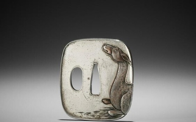 A SILVERED TSUBA WITH A RECUMBENT DEER